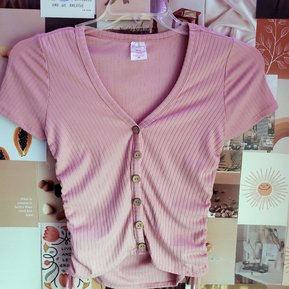 A no boundaries pink shirt